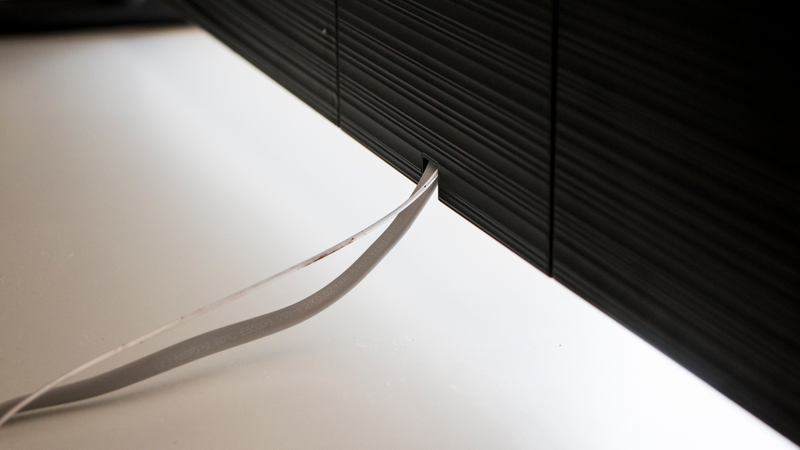 These are the only cords that come out of the Frame. They plug into the One Connect Box that you can stash out of sight.